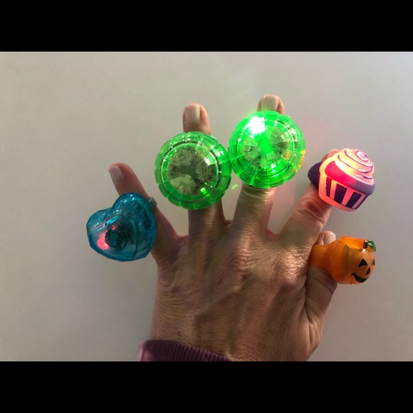6 Rings that light up when you press the button! - Picture 1 of 9